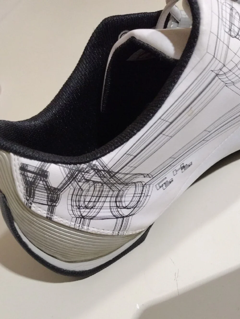 Men's Puma Future Cat S1 White Sneakers with Black Logos and Graphic Details